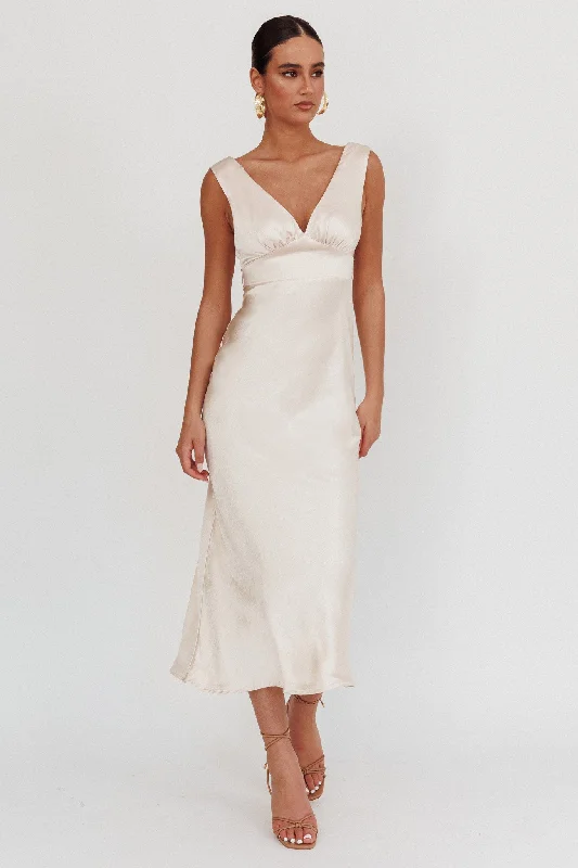 Midi dresses with pleated bodices for a classic and tailored look Leila V-Neck Low Back Satin Midi Dress Ivory Midi dresses with pleated bodices for a classic and tailored look Leila V-Neck Low Back Satin Midi Dress Ivory