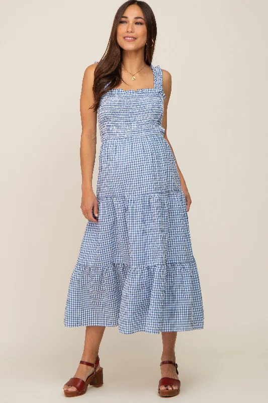 Maternity dress for a baby's first bus ride Blue Gingham Smocked Tiered Maternity Midi Dress Maternity dress for a baby's first bus ride Blue Gingham Smocked Tiered Maternity Midi Dress
