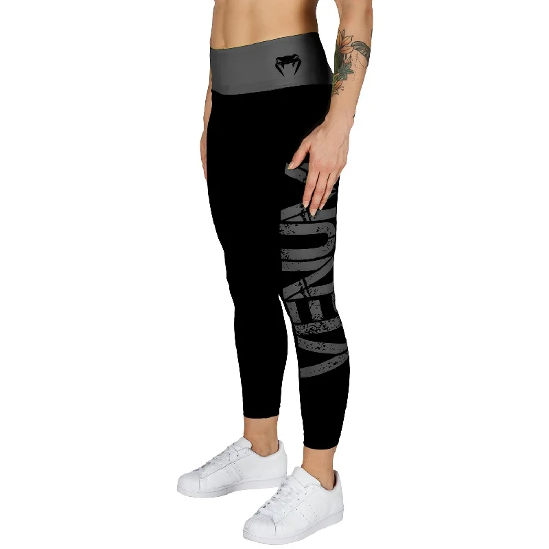 Women's High - Waisted Tight Trousers with Side Slits in Beige for a Trendy LookLegging Femme Venum Power - Noir/Gris Women's High - Waisted Tight Trousers with Side Slits in Beige for a Trendy LookLegging Femme Venum Power - Noir/Gris