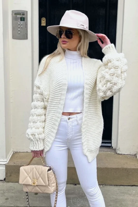 color block women cardigan with bold huesGoldie cream bobble sleeve knitted cardigan