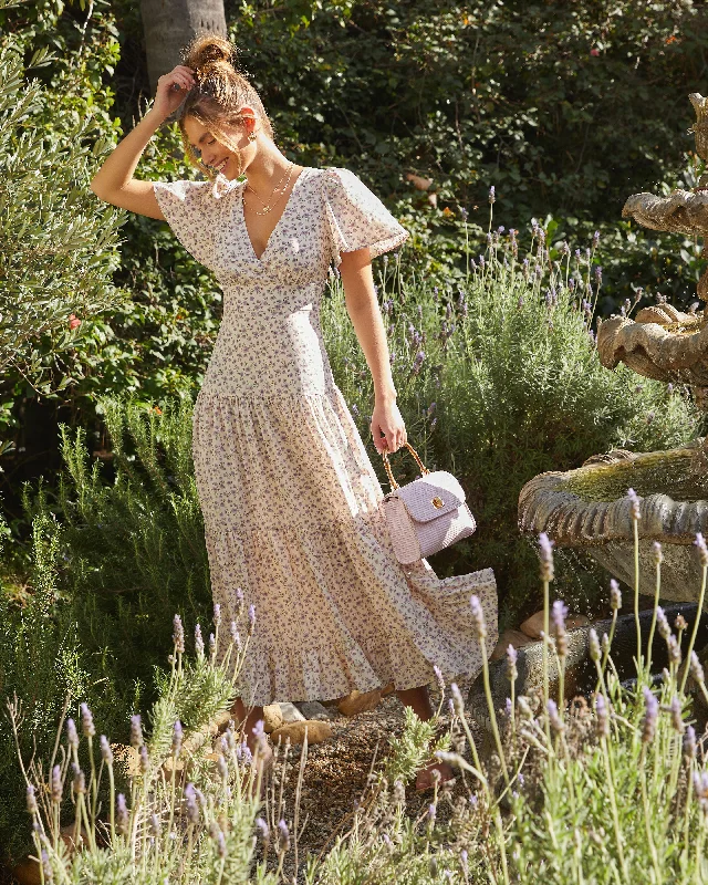 Midi dresses with animal prints for a bold and confident appearanceAshlyn V-Neck Tiered Midi Dress Midi dresses with animal prints for a bold and confident appearanceAshlyn V-Neck Tiered Midi Dress
