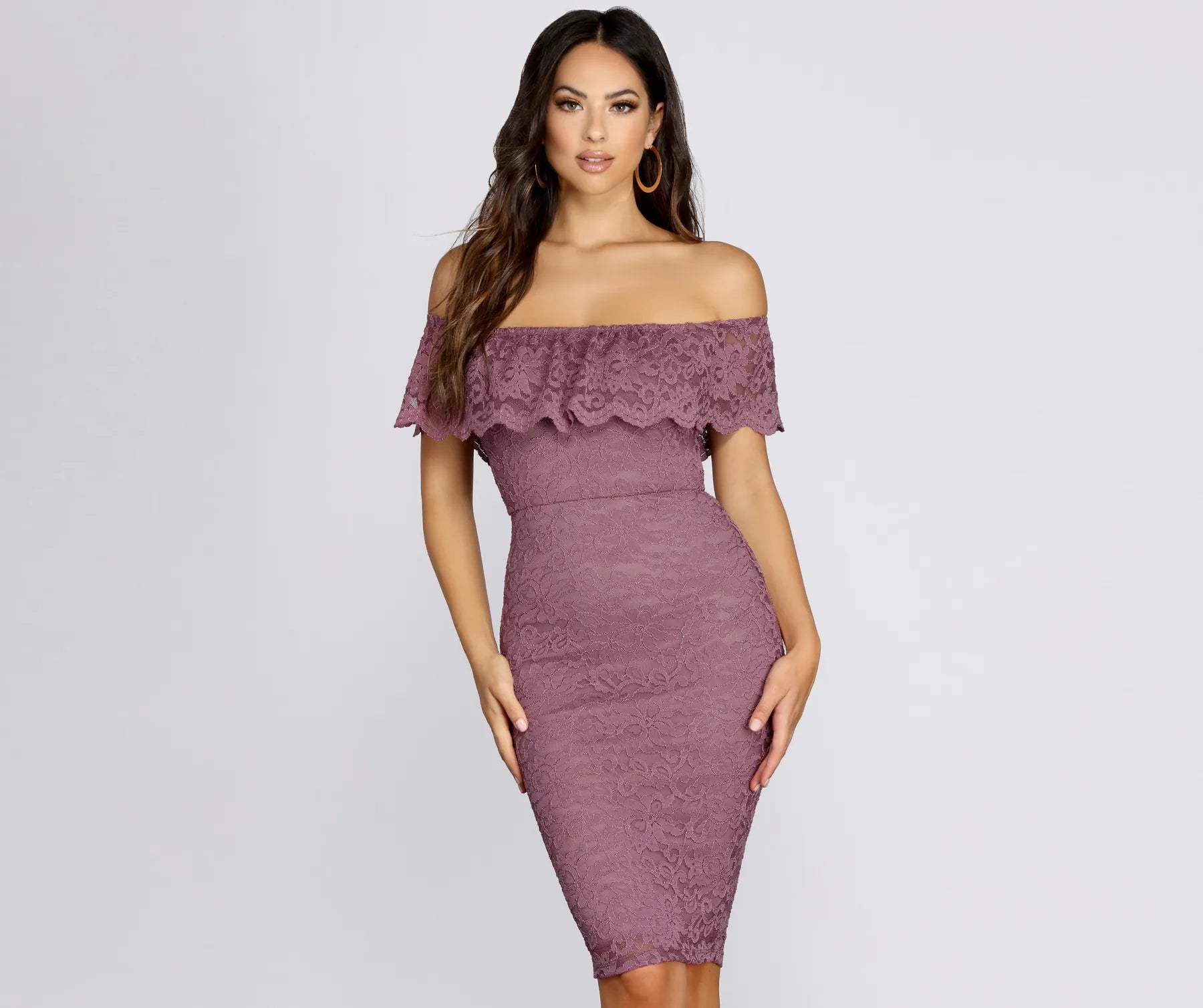 Midi dresses with keyhole backs for a flirty and unexpected detailStunner In Lace Midi Dress