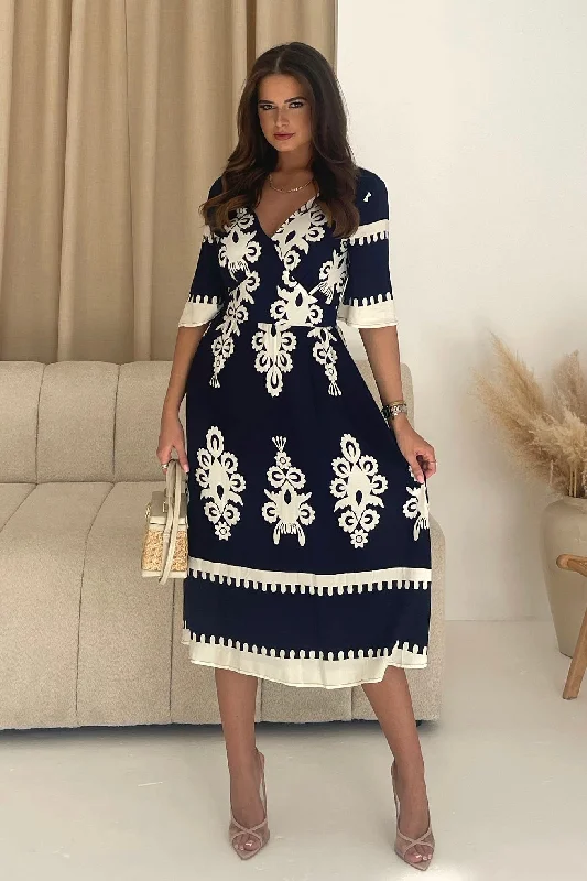 A - line midi dresses with floral prints for spring brunchesSuzanne Blue Boarder Midi Dress